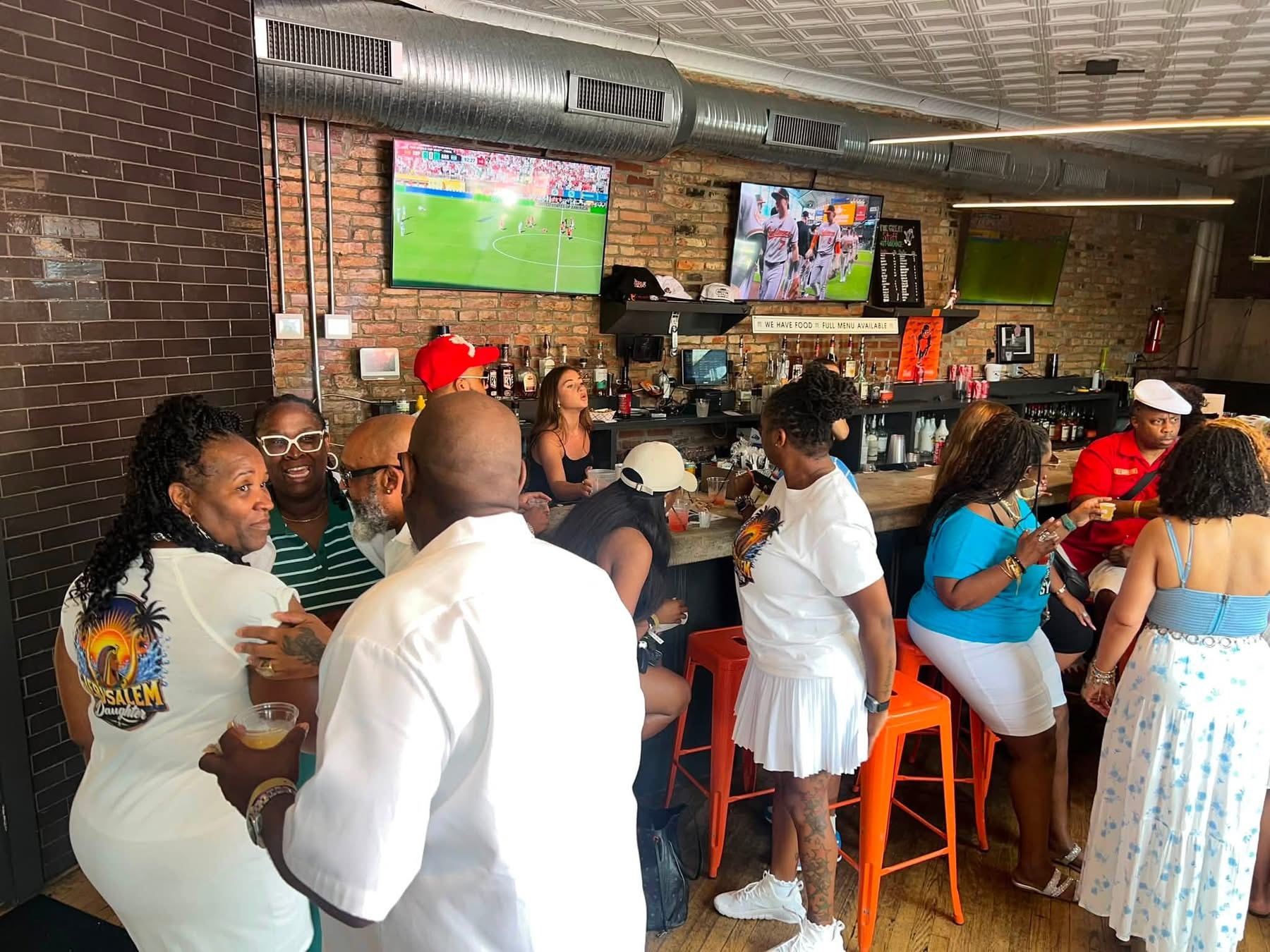 Nobles and guests gathered at the bar during the Summer Sizzle