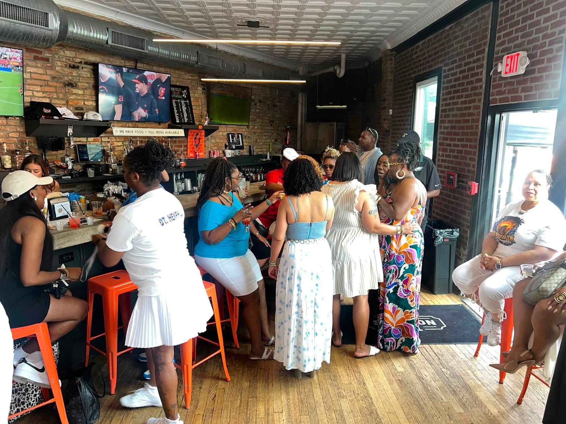 Lively crowd at the Summer Sizzle indoor celebration